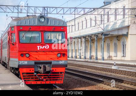 Russian train on the platform. Public transport. Russia, Leningrad region Lyuban March 24, 2019 Stock Photo