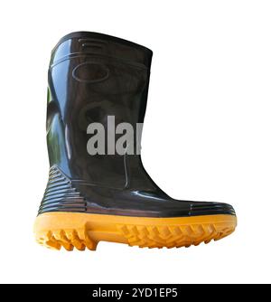 Side view of one side of black gumboot or black boot for working in garden is isolated on white background with clipping path. Stock Photo