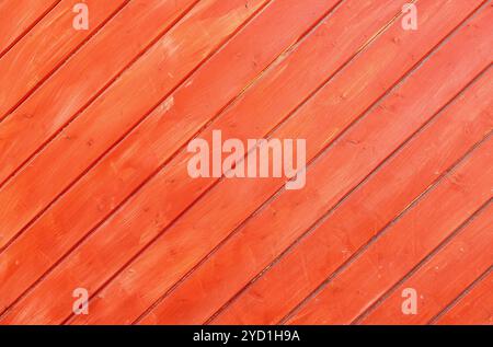 Red wooden planks with natural patterns as background Stock Photo