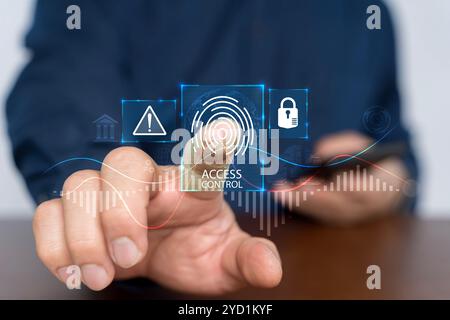 Access control concept. Businessman using mobile smartphone with virtual access control icon for access security personal data. Automatic access contr Stock Photo