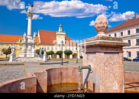 Old paved street and fountain in Tvrdja historic town of Osijek Stock Photo