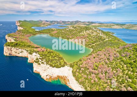 Telascica nature park cliffs and green Mir lake on Dugi Otok island aerial view Stock Photo