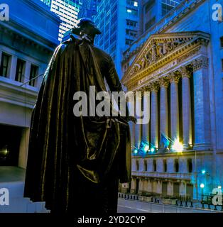 New YorkCity, NY, USA,  Scenic View of 'New York Stock Exchange' with Statue of George Washington, from behind, at night Stock Photo