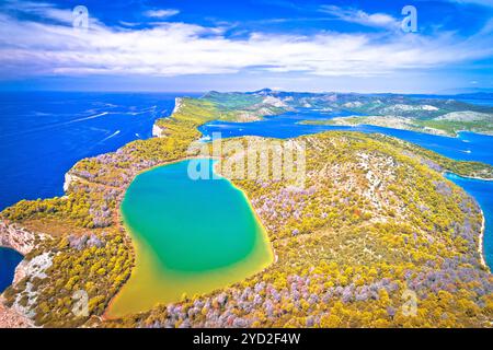 Telascica nature park cliffs and green Mir lake on Dugi Otok island aerial view Stock Photo