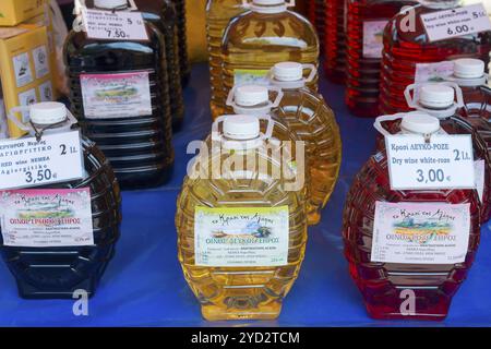 Different types of wine in plastic bottles at a market, market, Nafplio, Nauplia, Nauplion, Nafplion, Argolis, Peloponnese, Greece, Europe Stock Photo