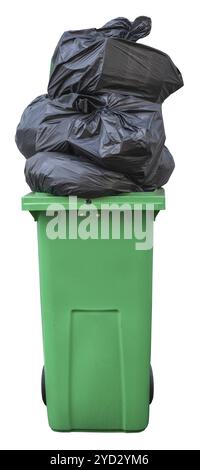 A Green Wheelie Bin, Overflowing With Bin Bags (Trash), Isolated On A White Background Stock Photo