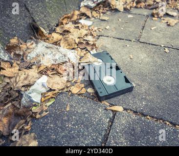 Conceptual Image Of An Abandoned VHS Tape In The Street Stock Photo