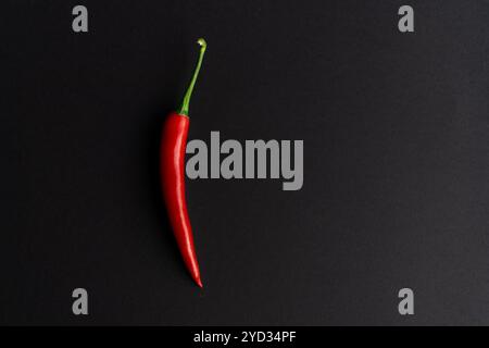 Chili peppers composited perfectly against black backround Stock Photo