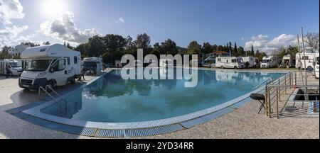 Ouezzane, Morocco, 2 Marhc, 2024: many motor homes and RVs parked around a swimming pool at a hotel in the Rif mountains of northern Morocco, Africa Stock Photo