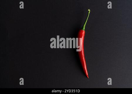 Chili peppers composited perfectly against black backround Stock Photo