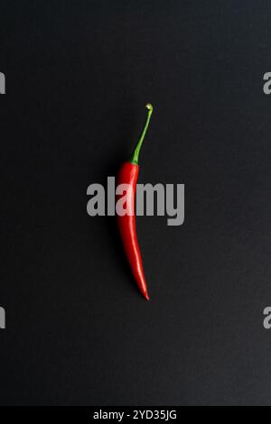 Chili peppers composited perfectly against black backround Stock Photo