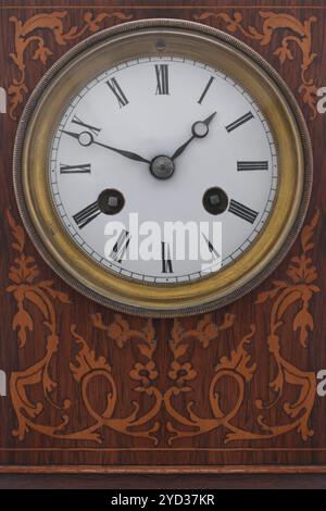 Antique carriage clock on white background Stock Photo