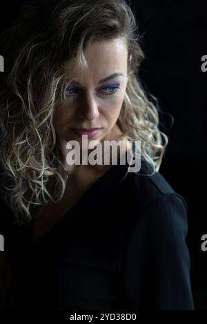Blond woman portrait looking away and pensive. Stock Photo