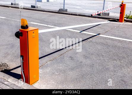 Automatic rising arm barrier for entry or stop traffic Stock Photo