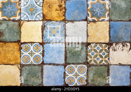 Various types of aged ceramic tiles with Mediterranean style patterns. Stock Photo