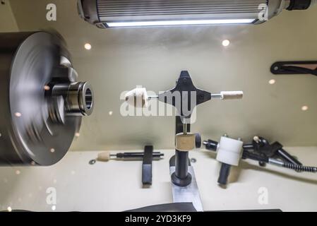Cnc lathe for polishing surfaces. The CNC lathe machine or Turning machine. Turning numerical control machine with tools and chuck. Inside view of a c Stock Photo