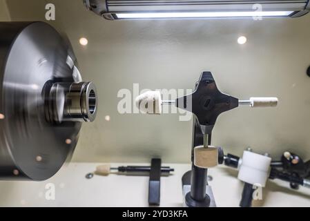 Cnc lathe for polishing surfaces. The CNC lathe machine or Turning machine. Turning numerical control machine with tools and chuck. Inside view of a c Stock Photo