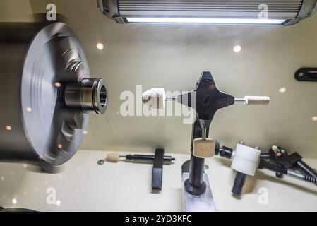 Cnc lathe for polishing surfaces. The CNC lathe machine or Turning machine. Turning numerical control machine with tools and chuck. Inside view of a c Stock Photo