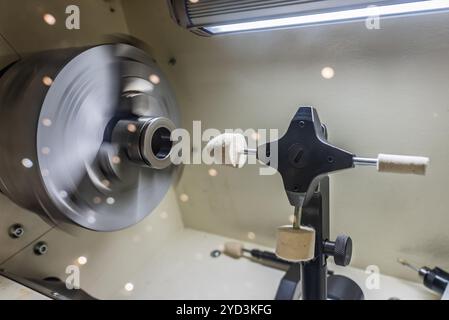 Cnc lathe for polishing surfaces. The CNC lathe machine or Turning machine. Turning numerical control machine with tools and chuck. Inside view of a c Stock Photo