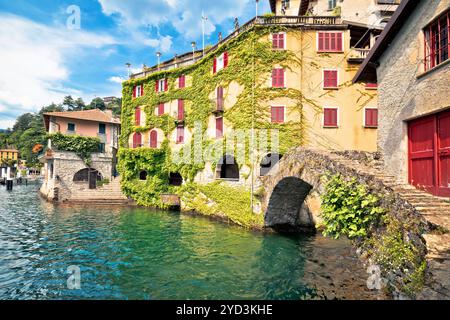 Town of Nesso historic stone bridge and waterfront on Como Lake Stock Photo