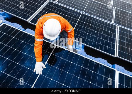 Professional Engineer Service Floating Solar Panel. Worker Maintenance Cleaning Replacing Solar Panel. Solar photovoltaic panel system in Industry lak Stock Photo