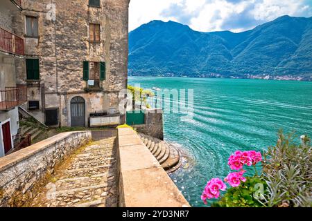 Town of Nesso historic stone bridge and waterfront on Como Lake Stock Photo