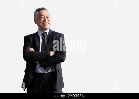 Smart senior businessman. Asian male executive manager, Business director in suit happy smiling good mental people standing confident isolated on whit Stock Photo