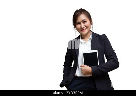 smart business women Asian Thai working woman standing smiling with tablet device isolated on white background Stock Photo