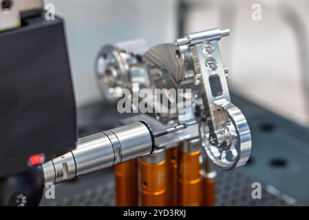 3d precision measurement on machine quality control parts. Measuring machine for finished parts after cnc machining. Measuring machine. 3D coordinate Stock Photo