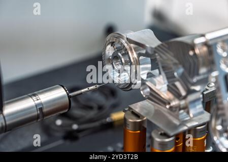 3d precision measurement on machine quality control parts. Measuring machine for finished parts after cnc machining. Measuring machine. 3D coordinate Stock Photo