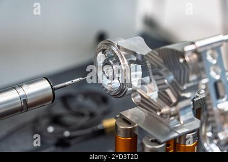 3d precision measurement on machine quality control parts. Measuring machine for finished parts after cnc machining. Measuring machine. 3D coordinate Stock Photo