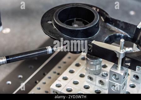 3d precision measurement on machine quality control parts. Measuring machine for finished parts after cnc machining. Measuring machine. 3D coordinate Stock Photo