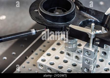 3d precision measurement on machine quality control parts. Measuring machine for finished parts after cnc machining. Measuring machine. 3D coordinate Stock Photo