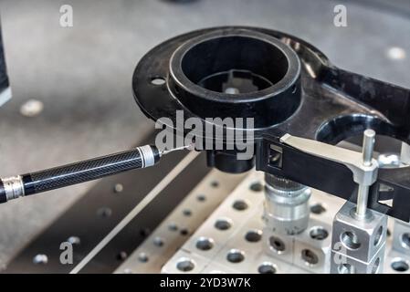 3d precision measurement on machine quality control parts. Measuring machine for finished parts after cnc machining. Measuring machine. 3D coordinate Stock Photo