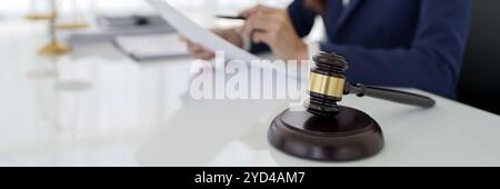 Lawyer or judge counselor reading a important legal contract in office. Stock Photo