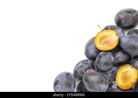 Fresh plum fruit isolated on white background. Clipping path. Top view Stock Photo