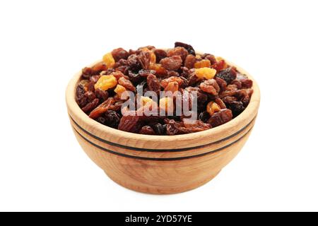 Raisins in wooden bowl isolated on white background. Top view Stock Photo