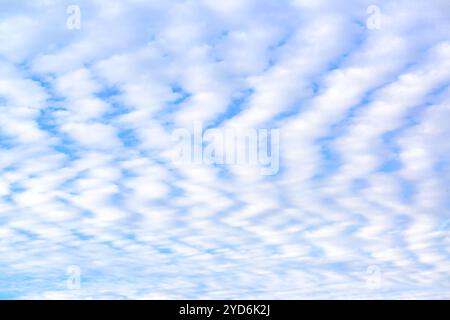 Blue sky and white spindrift cclouds - background, texture, cloudscape Stock Photo