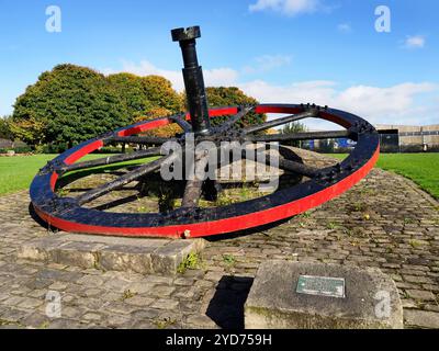 Rolling mill flywheel monument from the former Low Moor Steel Works donated in 1982 by Elsworth and Son Low Moor West Yorkshire England Stock Photo