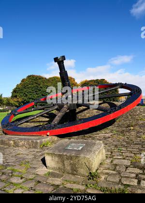 Rolling mill flywheel monument from the former Low Moor Steel Works donated in 1982 by Elsworth and Son Low Moor West Yorkshire England Stock Photo