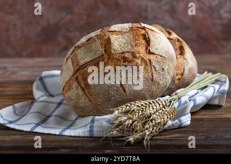 Two loaves of artisanal sourdough bread. Stock Photo