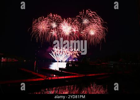 Beautiful colorful fireworks with reflections in water. Brno dam, the city of Brno-Europe. International Fireworks Competition. Stock Photo