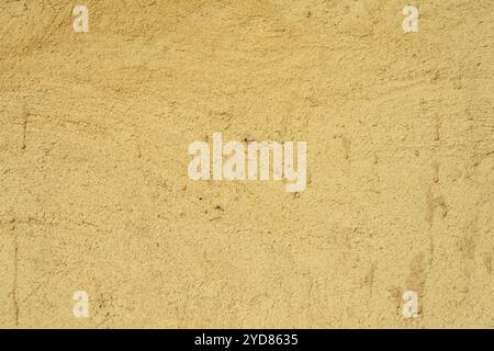 Abstract clay wall grunge texture background interior decoration mud wall texture Sandstone texture Natural background. Stock Photo