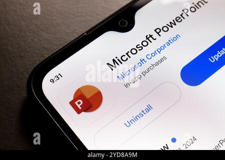 October 25, 2024, Brazil. In this photo illustration, the Microsoft PowerPoint app logo is displayed on a smartphone screen Stock Photo