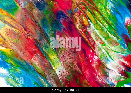 Illustration of marbled, watery texture with organic and multicolored waves created with acrylic paint in primary colors perfect for backgrounds and t Stock Photo