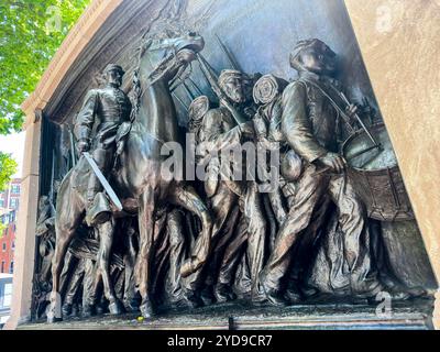 The Memorial to Robert Gould Shaw and the Massachusetts Fifty-Fourth Regiment, a bronze relief by Augustus Saint-Gaudens, honors Colonel Shaw and the Stock Photo