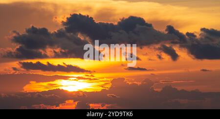 Dramatics orange and red sunset or sunrise sky with clouds for background Stock Photo