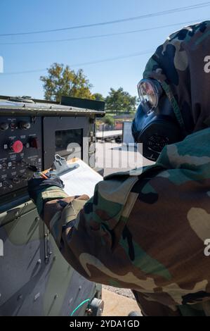 HVAC and power production Airmen with the 131st Bomb Wing perform their duties during a chemical, biological, radiological, nuclear, and explosives (C Stock Photo