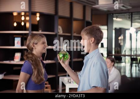 Portrait of students in science classroom play with each other and have fun before attend class. Stock Photo