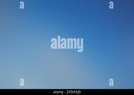 Blue grainy gradient background fading to white with copy space Stock Photo
